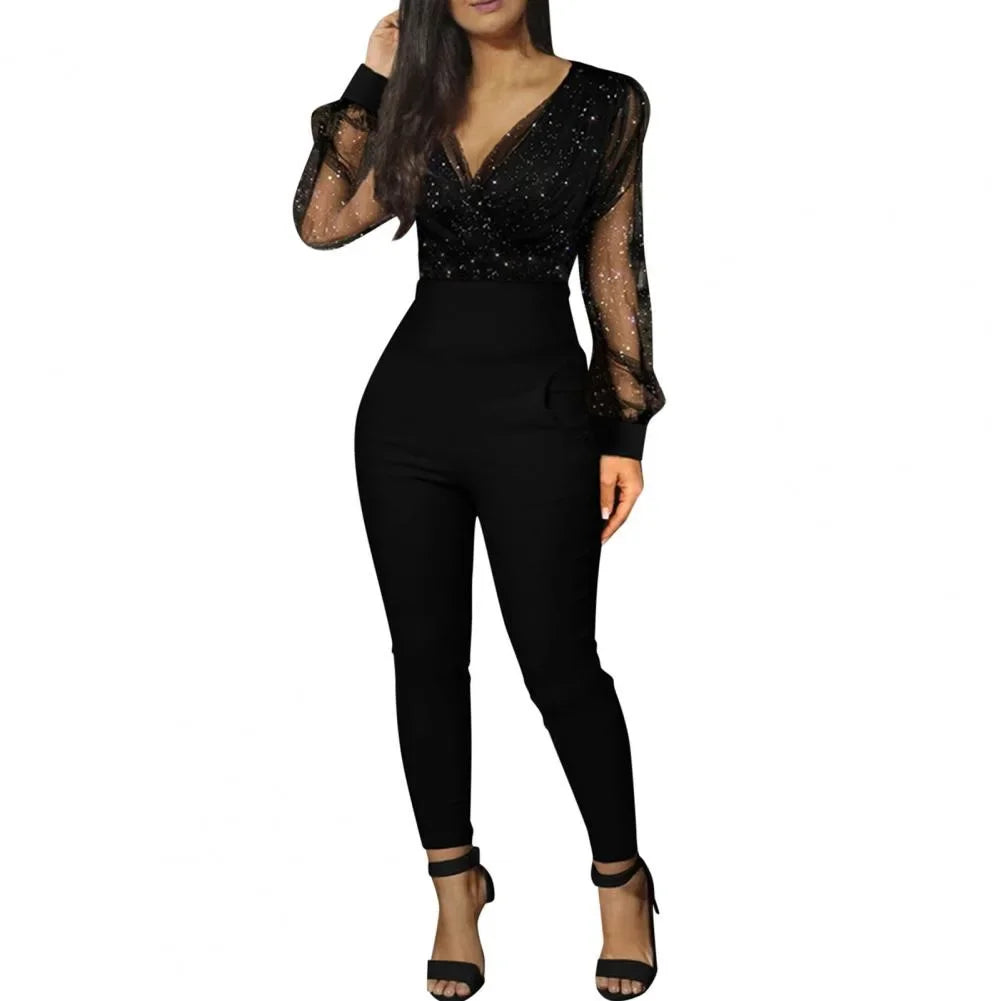 Mono Elegante Negro con Lentejuelas y Manga Larga de Encaje