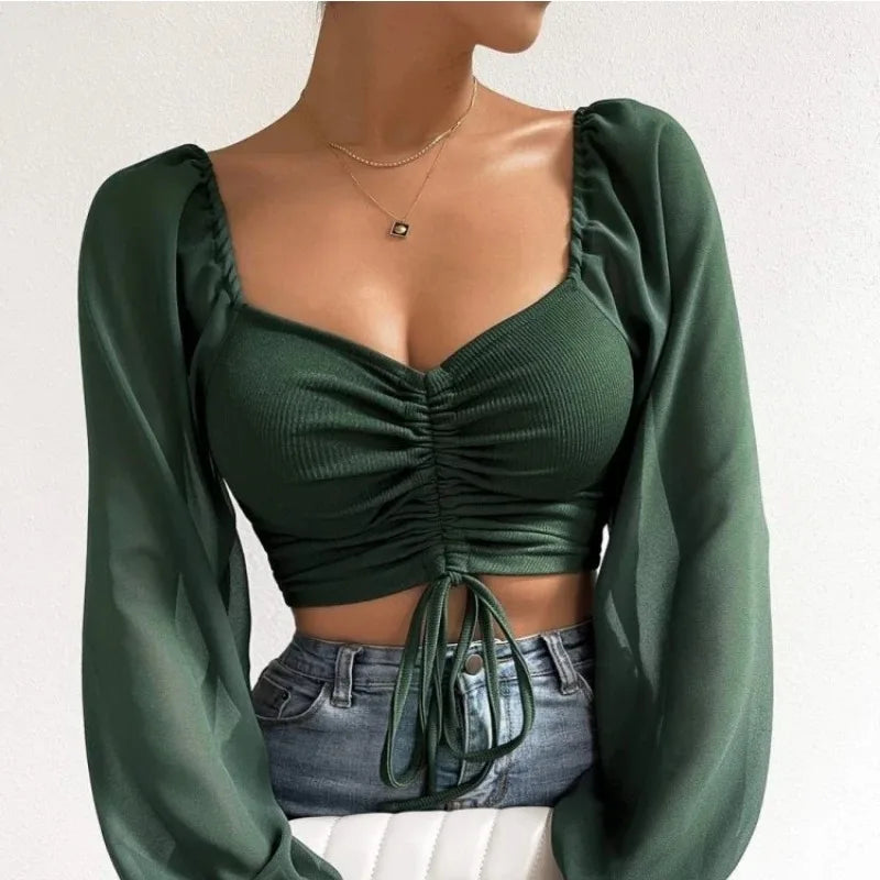 Blusa Sexy de malla con mangas acampanadas y cordón para mujer, blusa con ombligo descubierto en el pecho.