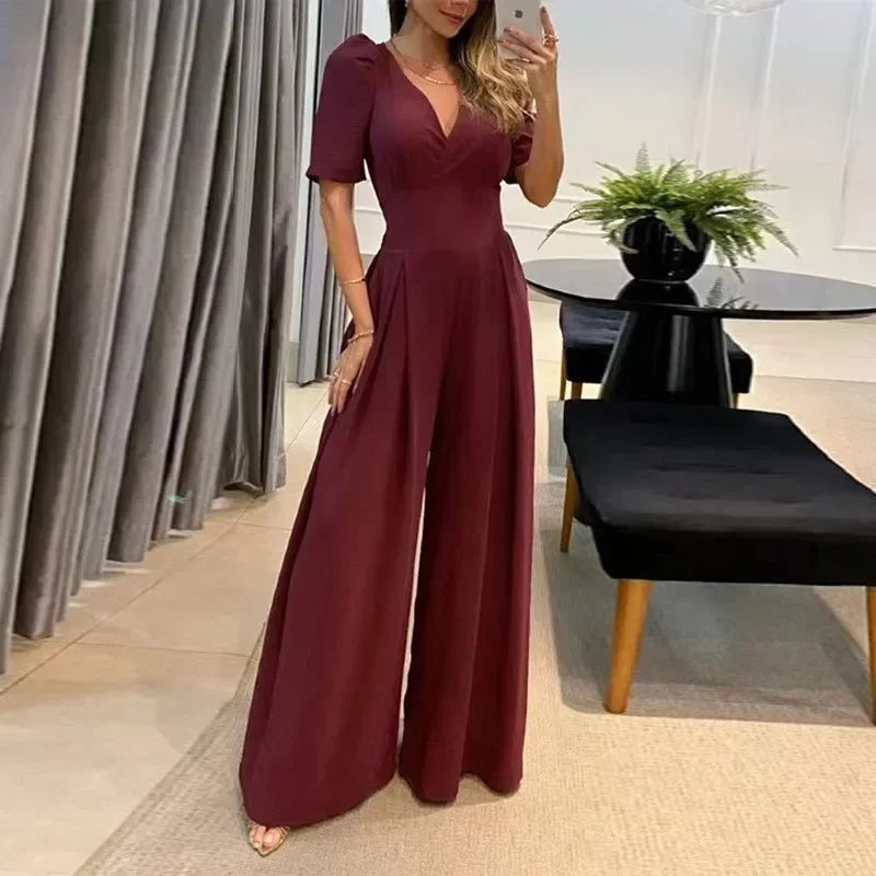Mono elegante con cuello en V y pantalón palazzo
