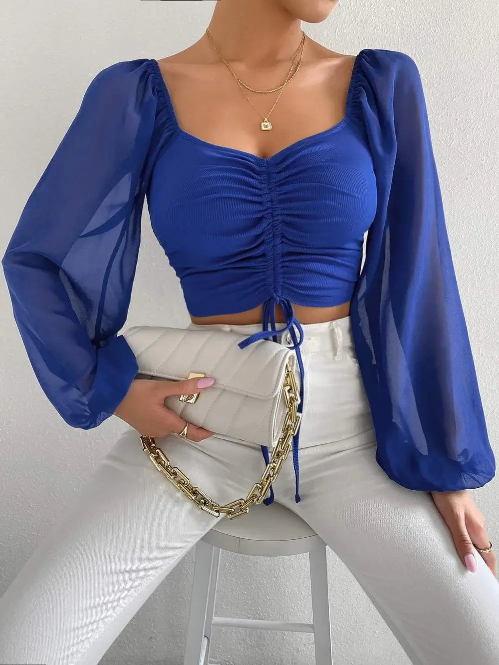 Blusa Sexy de malla con mangas acampanadas y cordón para mujer, blusa con ombligo descubierto en el pecho.