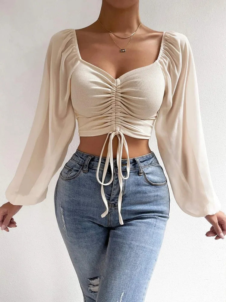 Top Manga Farol – Blusa Crop con Cordón Frontal Ajustable