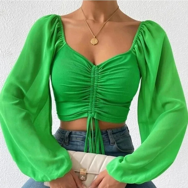 Blusa Sexy de malla con mangas acampanadas y cordón para mujer, blusa con ombligo descubierto en el pecho.