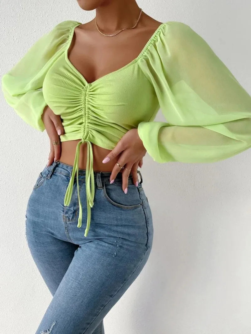 Top Manga Farol – Blusa Crop con Cordón Frontal Ajustable