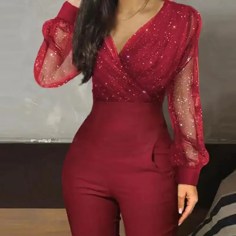 Mono Elegante Negro con Lentejuelas y Manga Larga de Encaje