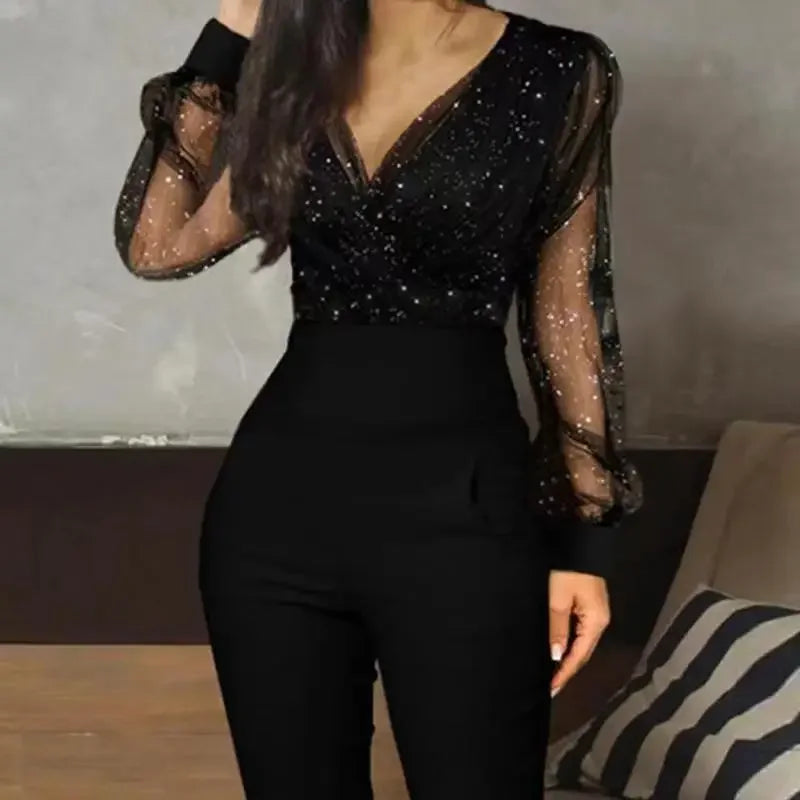 Mono Elegante Negro con Lentejuelas y Manga Larga de Encaje