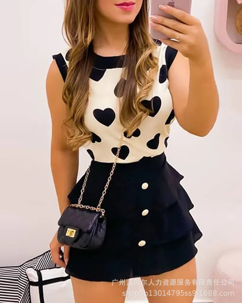 Conjunto de 2 piezas con blusa estampado de corazones y falda corta – Casual/Chic