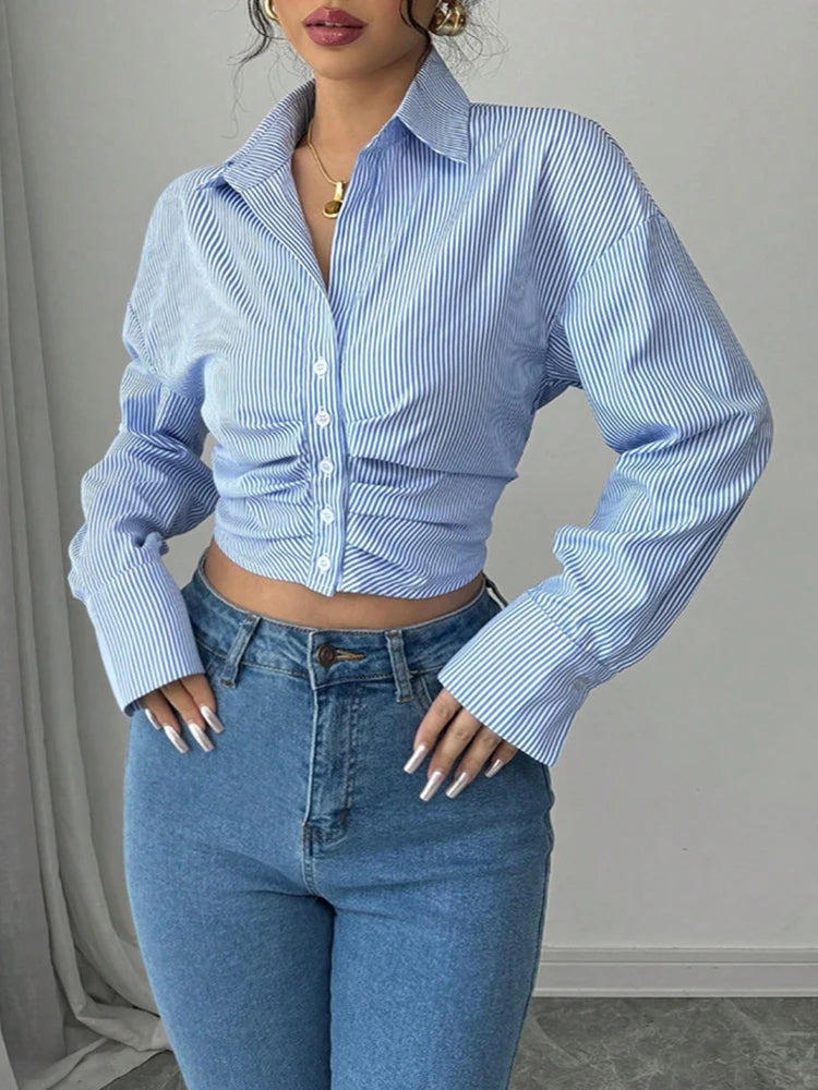 Camisa de manga larga azul con botones
