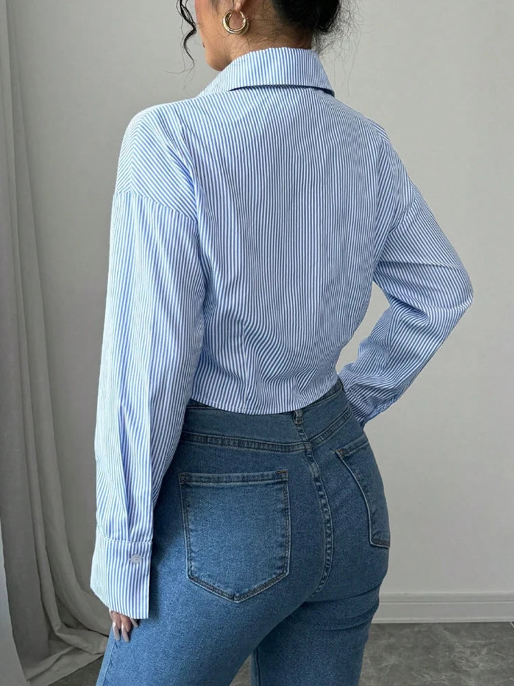 Camisa de manga larga azul con botones